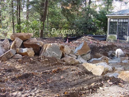 Dexpan Proyecto de excavacin y demolicin de rocas en el patio de una casa